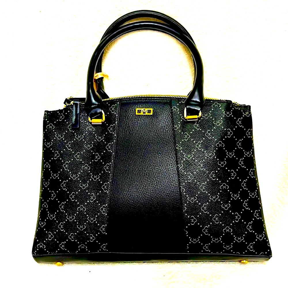 NWT 6 pockets black  leather Handbag.